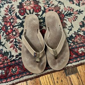 barely broken in rainbow flip flops